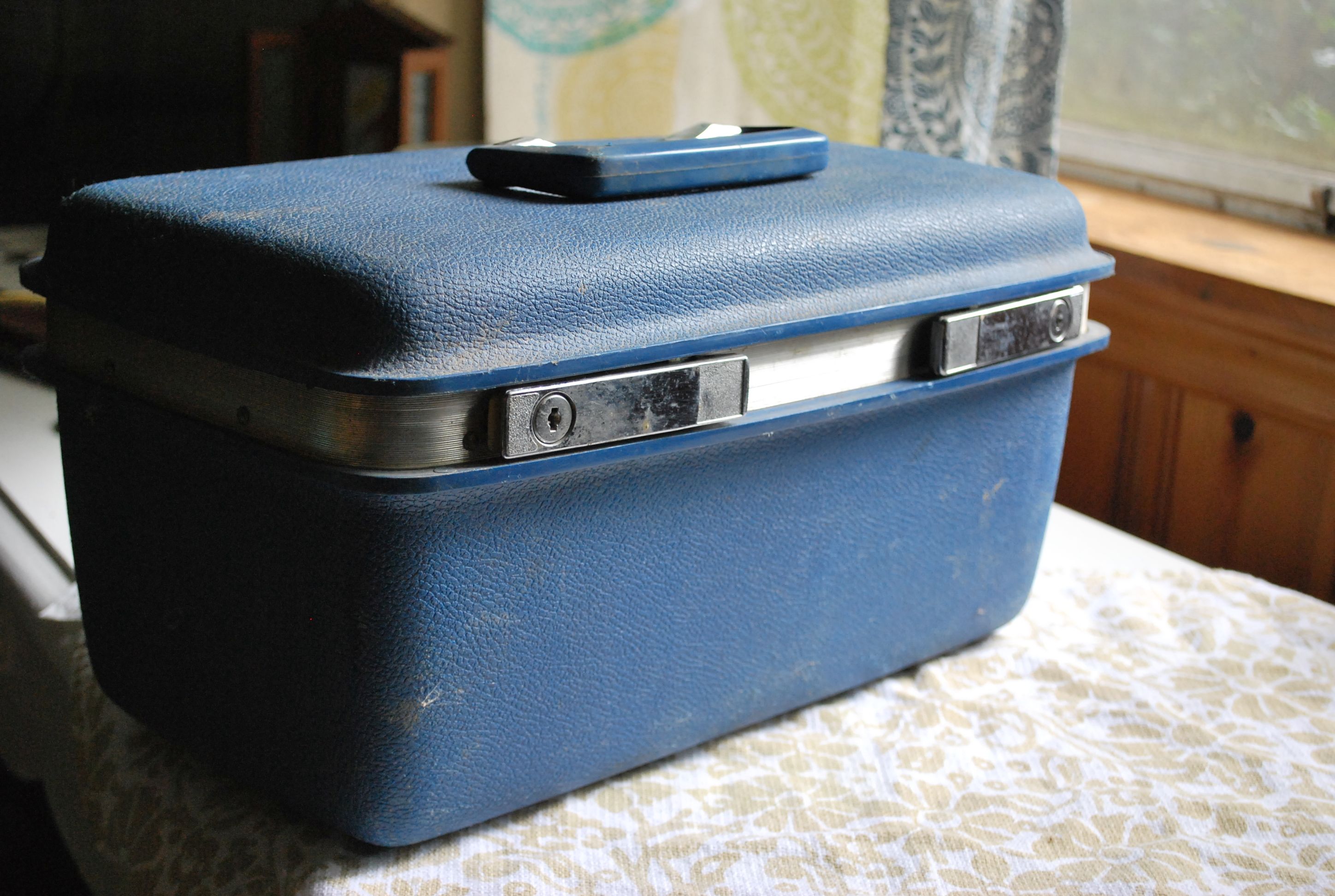 Vintage luggage that will become an herbal first aid kit