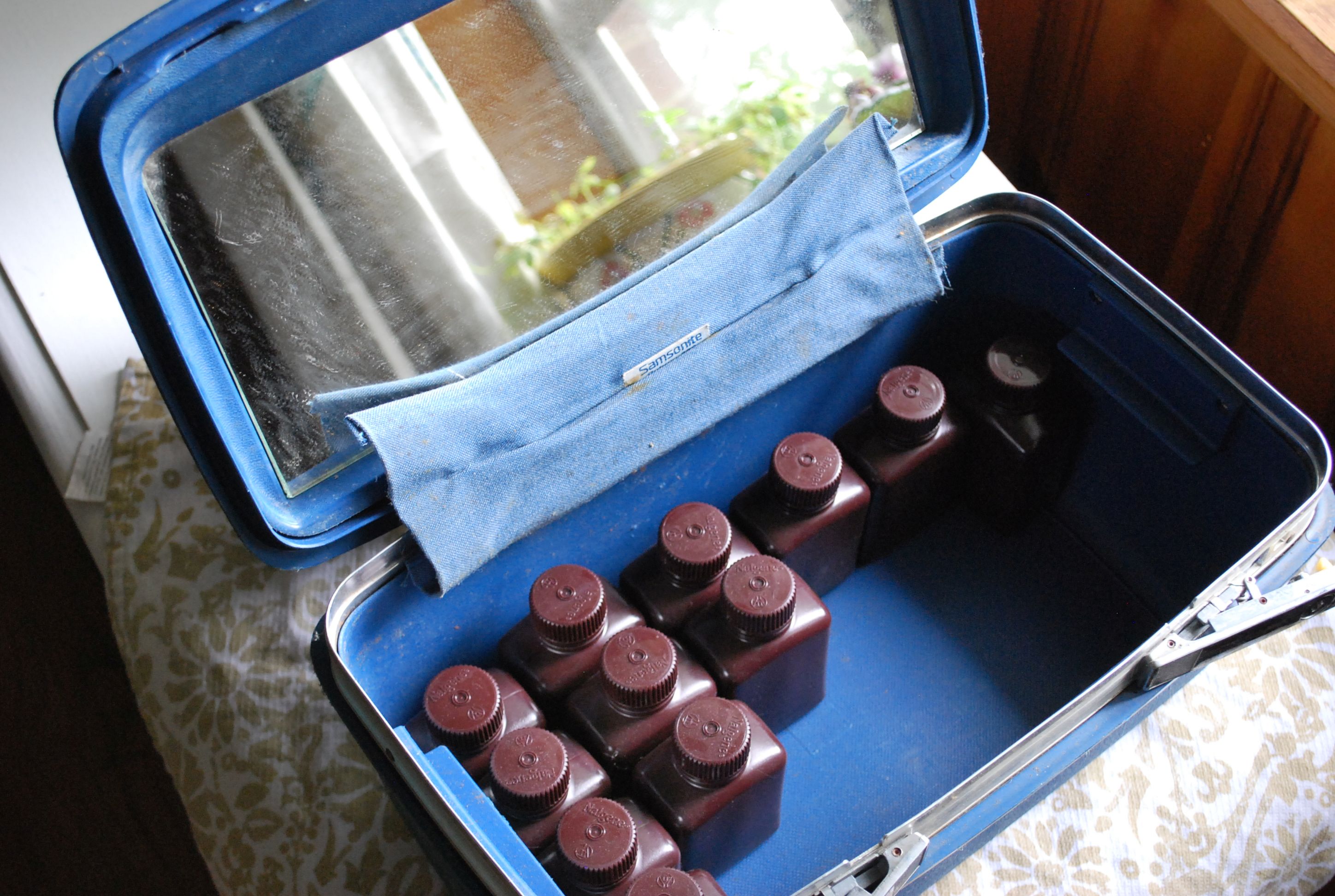 Interior view of vintage luggage before painting