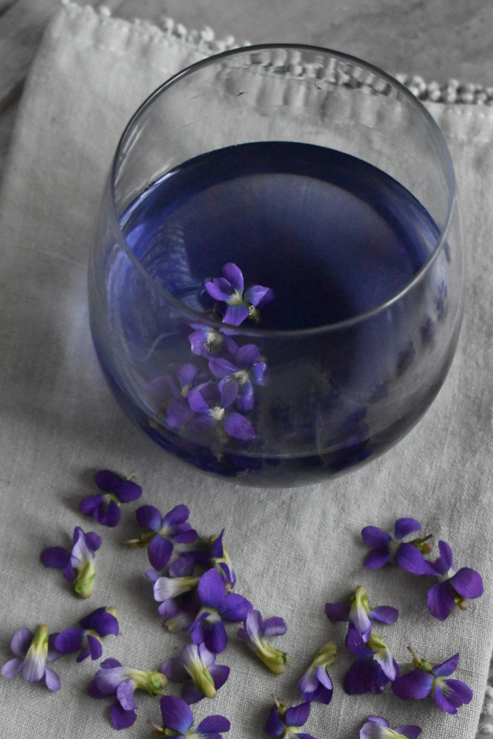 Beautiful blue tea with foraged violets indie herbalist